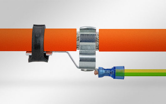 Shield clamps for PE conductors