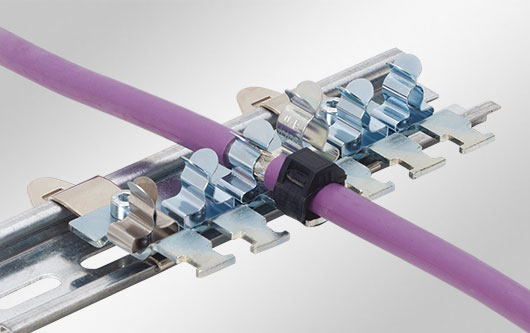Clamp assembly for 35 mm top hat DIN rails