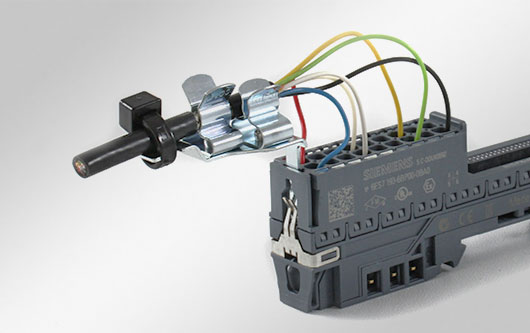 Shield clamps for bus modules